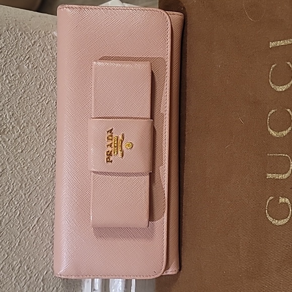 Prada Handbags - Prada Pink coated canvas wallet